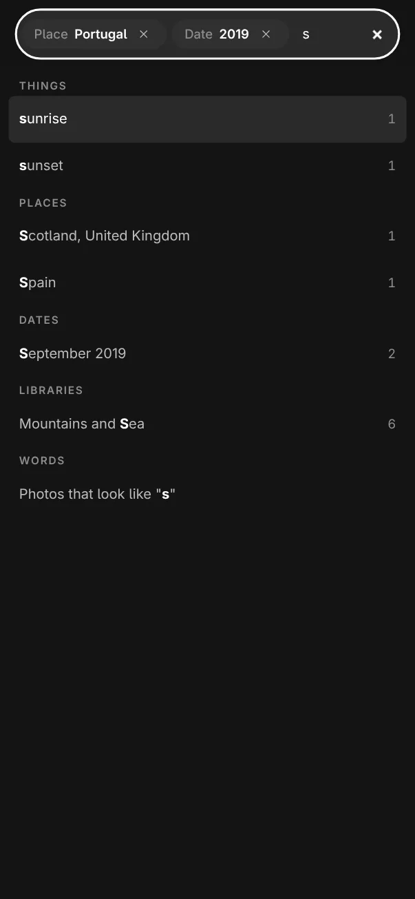 Searching on a phone: the field fills the bar with Place Portugal, Date 2019 and the letter s, and the suggestions fill the screen under it