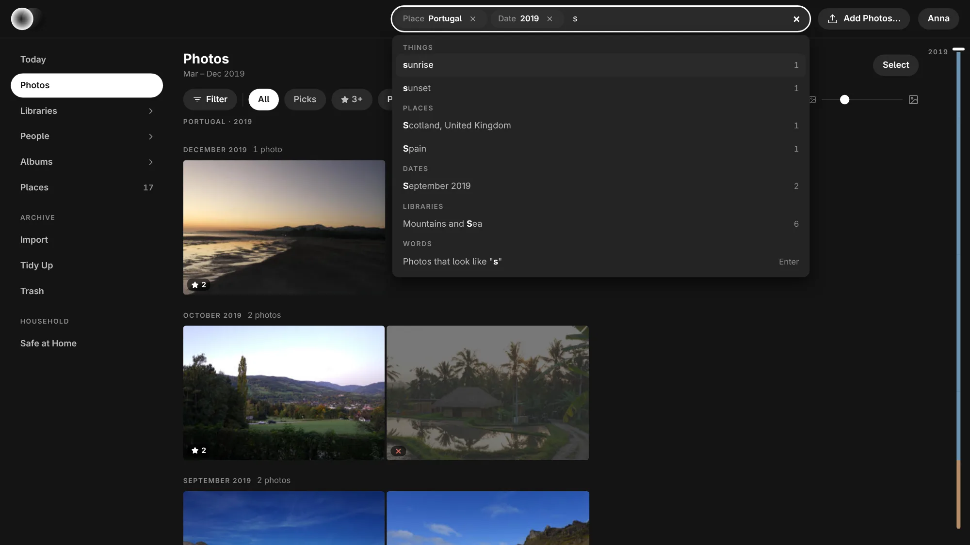 Searching in Numa Home: the field at the top holds Place Portugal and Date 2019 as tokens, each with its ×, and the letter s; under it the suggestions: Things with sunrise and sunset, Places with Scotland and Spain, Dates with September 2019, Libraries with Mountains and Sea, each with its count, and Words with Photos that look like "s" and Enter; behind it Photos with Portugal · 2019 under the Filter row