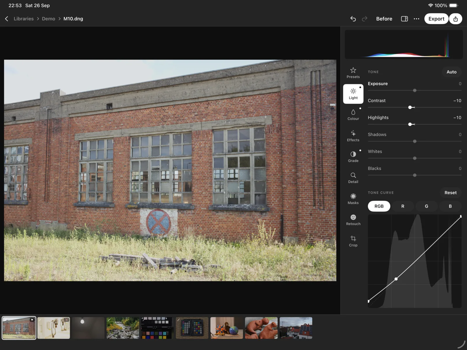 The iPad's classic editor on Light: the photograph, the panel with its rail on the right, and the filmstrip