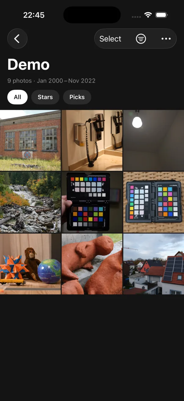 A library on the iPhone: a grid of photographs with All, Stars and Picks