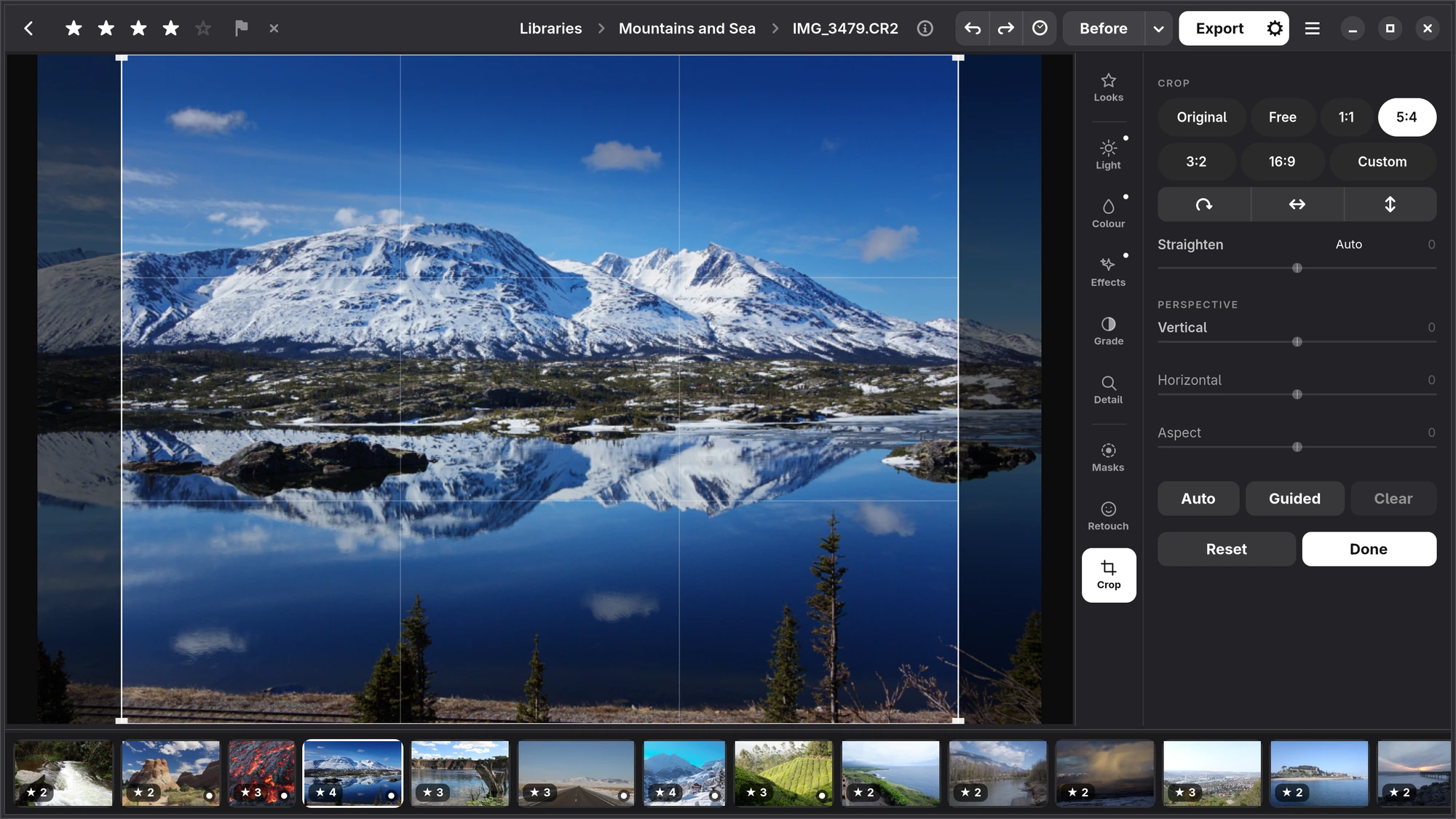 The Crop tab on a mountain lake: the frame at 5:4 with a grid of thirds; Original, Free, 1:1, 5:4, 3:2, 16:9 and Custom; turn and flip, Straighten, Perspective, and Auto, Guided, Reset and Done