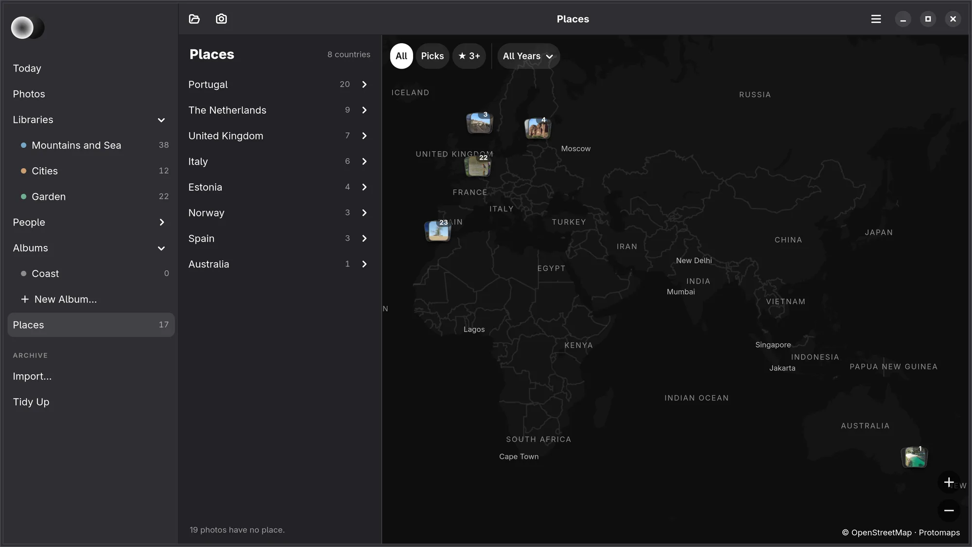 Places on Linux: the list with Portugal 20, The Netherlands 9, United Kingdom 7, Italy 6, Estonia 4, Norway 3, Spain 3 and Australia 1, and 19 photos have no place; beside it the map of Europe to Australia in dark greys with a stack of prints and a count on each place; over it All, Picks, ★ 3+ and All Years